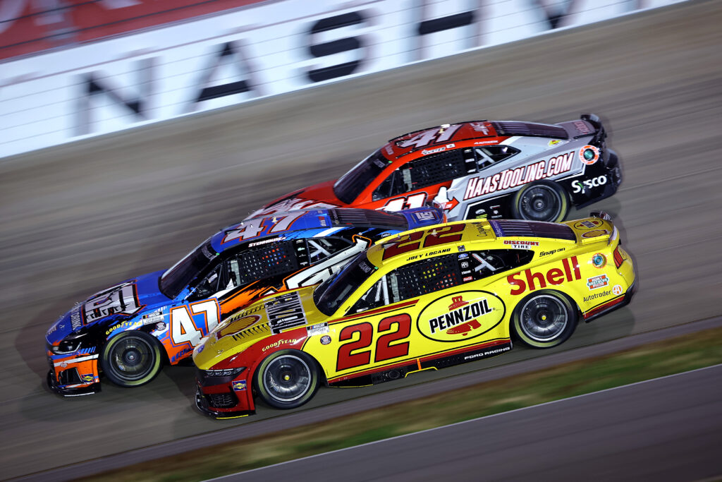 LEBANON, TENNESSEE - MAY 31: Joey Logano, driver of the #22 Shell Pennzoil Ford, Ricky Stenhouse Jr., driver of the #47 NOS Energy Chevrolet, and Cole Custer, driver of the #41 HaasTooling.com Chevrolet, race during the NASCAR Cup Series Cracker Barrel 400 at Nashville Superspeedway on May 31, 2026 in Lebanon, Tennessee. (Photo by Jonathan Bachman/Getty Images)