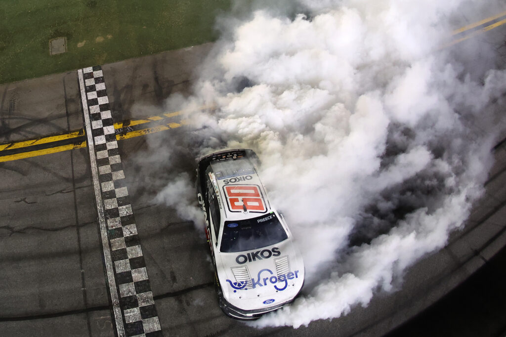 Ryan Preece, driver of the #60 Kroger/OIKOS Ford, celebrates with a burnout after winning the NASCAR Cup Series Coke Zero Sugar 400 at Daytona International Speedway on August 29, 2026 in Daytona Beach, Florida. (Photo by James Gilbert/Getty Images)