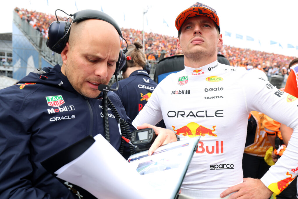 Max Verstappen of the Netherlands and Oracle Red Bull Racing and Gianpiero Lambiase, Head of Racing of Oracle Red Bull Racing on the grid prior to the F1 Grand Prix of Netherlands at Circuit Zandvoort on August 31, 2025 in Zandvoort, Netherlands. (Photo by Mark Thompson/Getty Images)