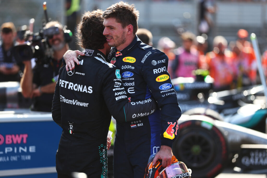 BUDAPEST, HUNGARY - JULY 26: Second placed Max Verstappen of the Netherlands and Oracle Red Bull Racing and Third placed Andrea Kimi Antonelli of Italy and Mercedes AMG Petronas F1 Team congratulate each other in parc ferme during the F1 Grand Prix of Hungary at Hungaroring on July 26, 2026 in Budapest, Hungary. (Photo by Andy Hone/LAT Images) // Getty Images / Red Bull Content Pool