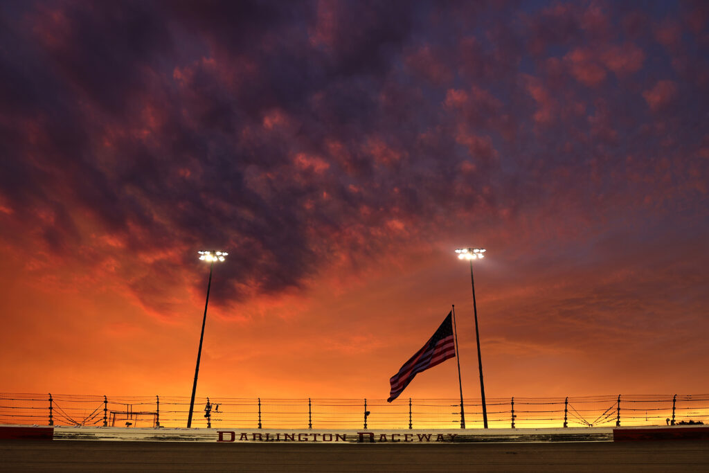 A general view of the "Darlington Raceway" wall signage as the sun sets during the NASCAR Cup Series Cook Out Southern 500 at Darlington Raceway on September 06, 2026 in Darlington, South Carolina. (Photo by Meg Oliphant/Getty Images)