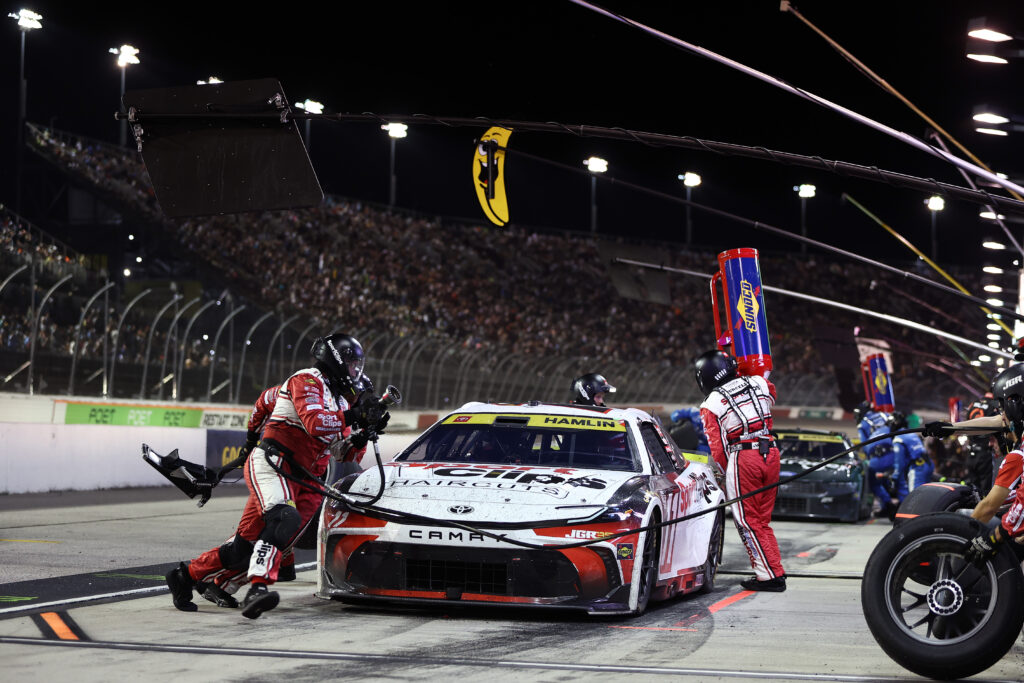Denny Hamlin, driver of the #11 Sport Clips Haircuts Toyota, pits during the NASCAR Cup Series Cook Out Southern 500 at Darlington Raceway on September 06, 2026 in Darlington, South Carolina. (Photo by Meg Oliphant/Getty Images)