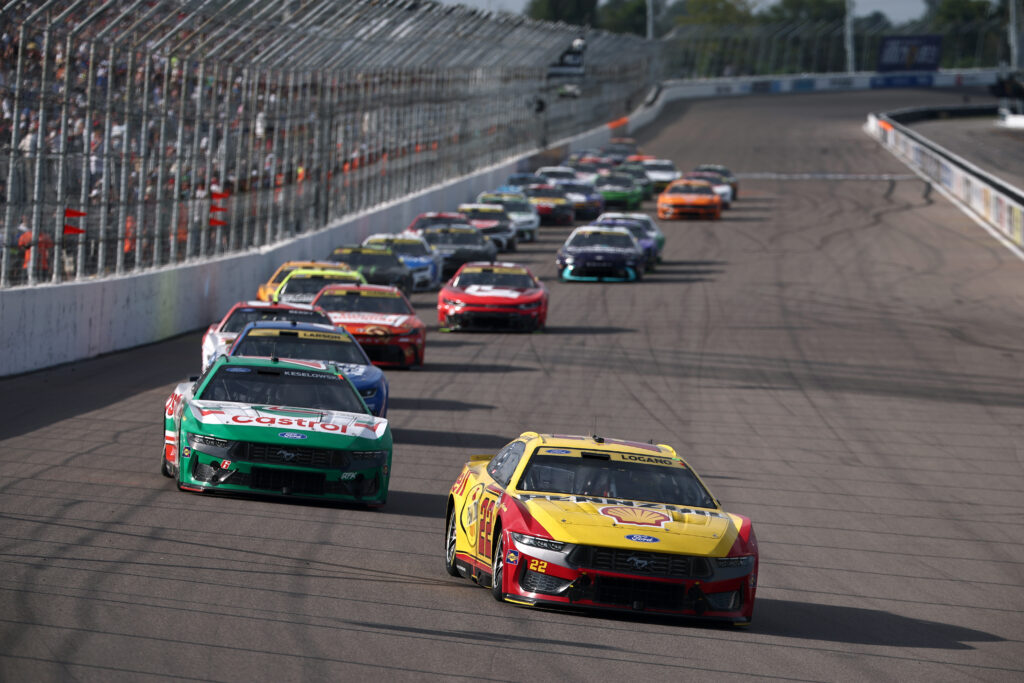 MADISON, ILLINOIS - SEPTEMBER 13: Joey Logano, driver of the #22 Shell Pennzoil Ford, and Brad Keselowski, driver of the #6 Castrol Ford, race during the NASCAR Cup Series Enjoy Illinois 300 at WWT Raceway on September 13, 2026 in Madison, Illinois. (Photo by Chris Graythen/Getty Images)