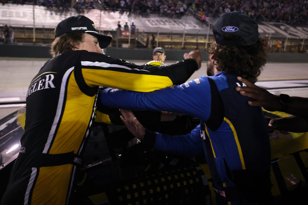 Carson Hocevar, driver of the #77 Zeigler Auto Group Chevrolet, (L) and Ryan Blaney, driver of the #12 WABASH Ford, get into an altercation after the NASCAR Cup Series Bass Pro Shops Night Race at Bristol Motor Speedway on September 19, 2026 in Bristol, Tennessee. (Photo by Chris Graythen/Getty Images)