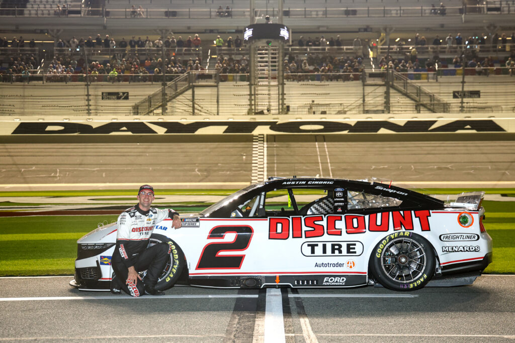 Austin Cindric, driver of the #2 Discount Tire Ford poses on track during qualifying for the NASCAR Cup Series Daytona 500 at Daytona International Speedway on February 12, 2025 in Daytona Beach, Florida. (Photo by Jared C. Tilton/Getty Images)