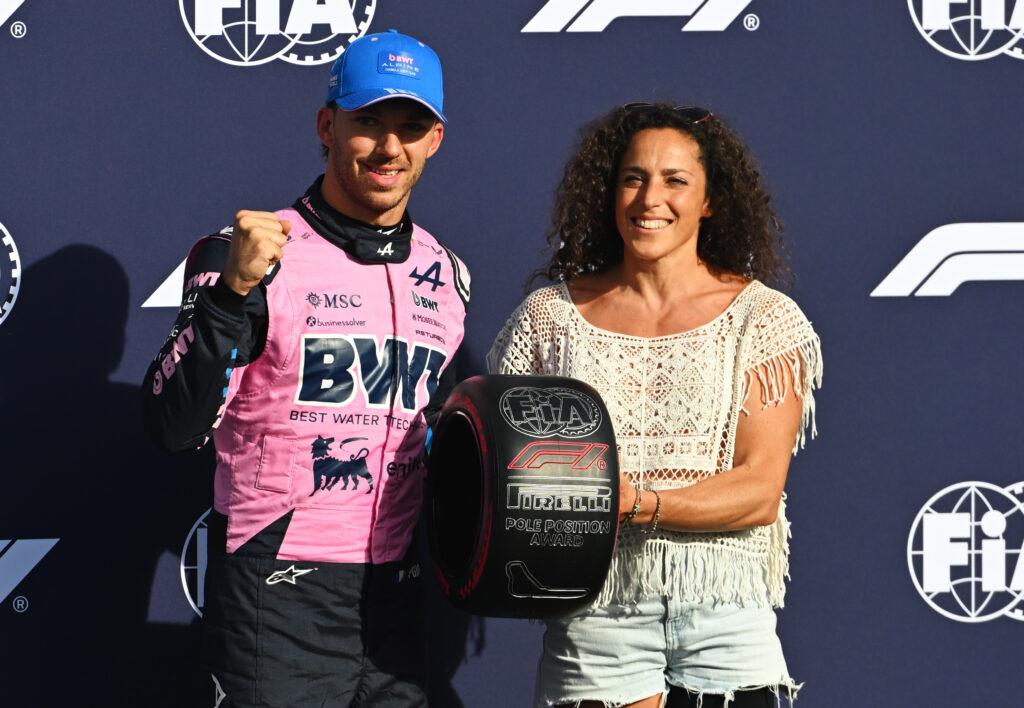 MONZA, ITALY - SEPTEMBER 05: Pole position qualifier Pierre Gasly of France and Alpine F1 is presented with his Pirelli Pole Position award by Federica Brignone in parc ferme during qualifying ahead of the F1 Grand Prix of Italy at Autodromo Nazionale Monza on September 05, 2026 in Monza, Italy. (Photo by Rudy Carezzevoli/Getty Images)