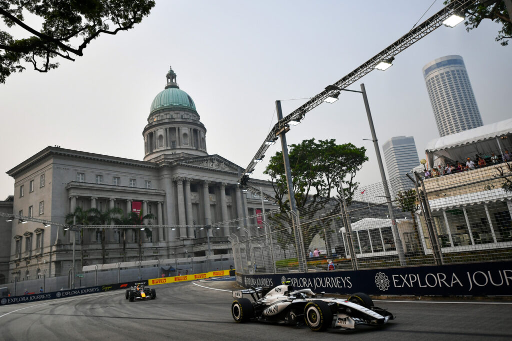 Valtteri Bottas of Finland driving the (77) Cadillac F1 Team MAC-26 Ferrari leads. Isack Hadjar of France driving the (6) Oracle Red Bull Racing RB22 Red Bull Ford Powertrainson track during practice ahead of the F1 Grand Prix of Singapore at Marina Bay Street Circuit