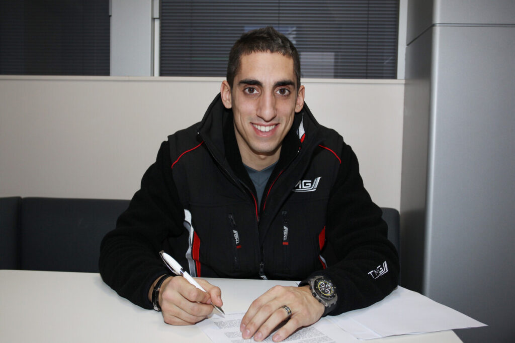 Sébastien Buemi during the contract signing with Toyota in 2012.