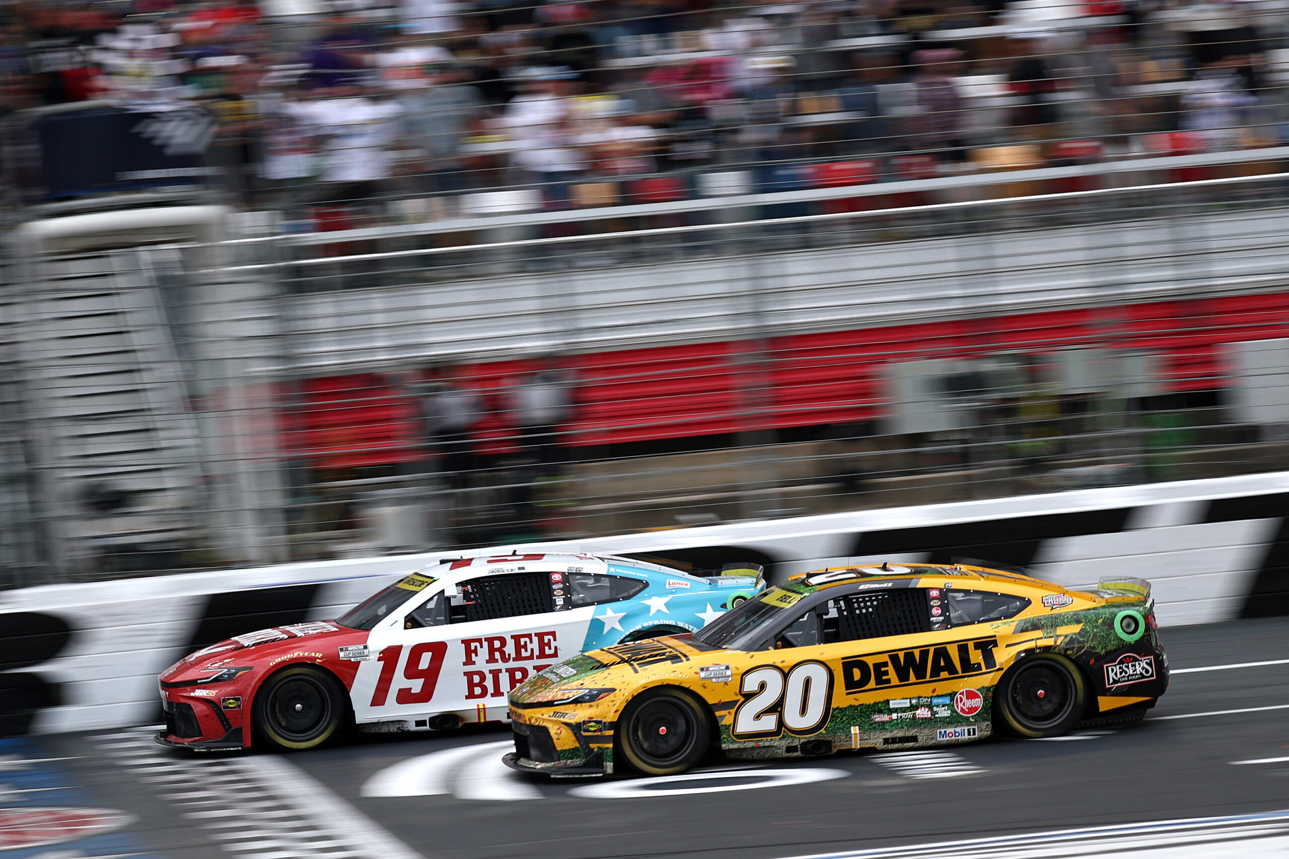 Briscoe wins at Charlotte: Closest finish of the season against teammate Bell