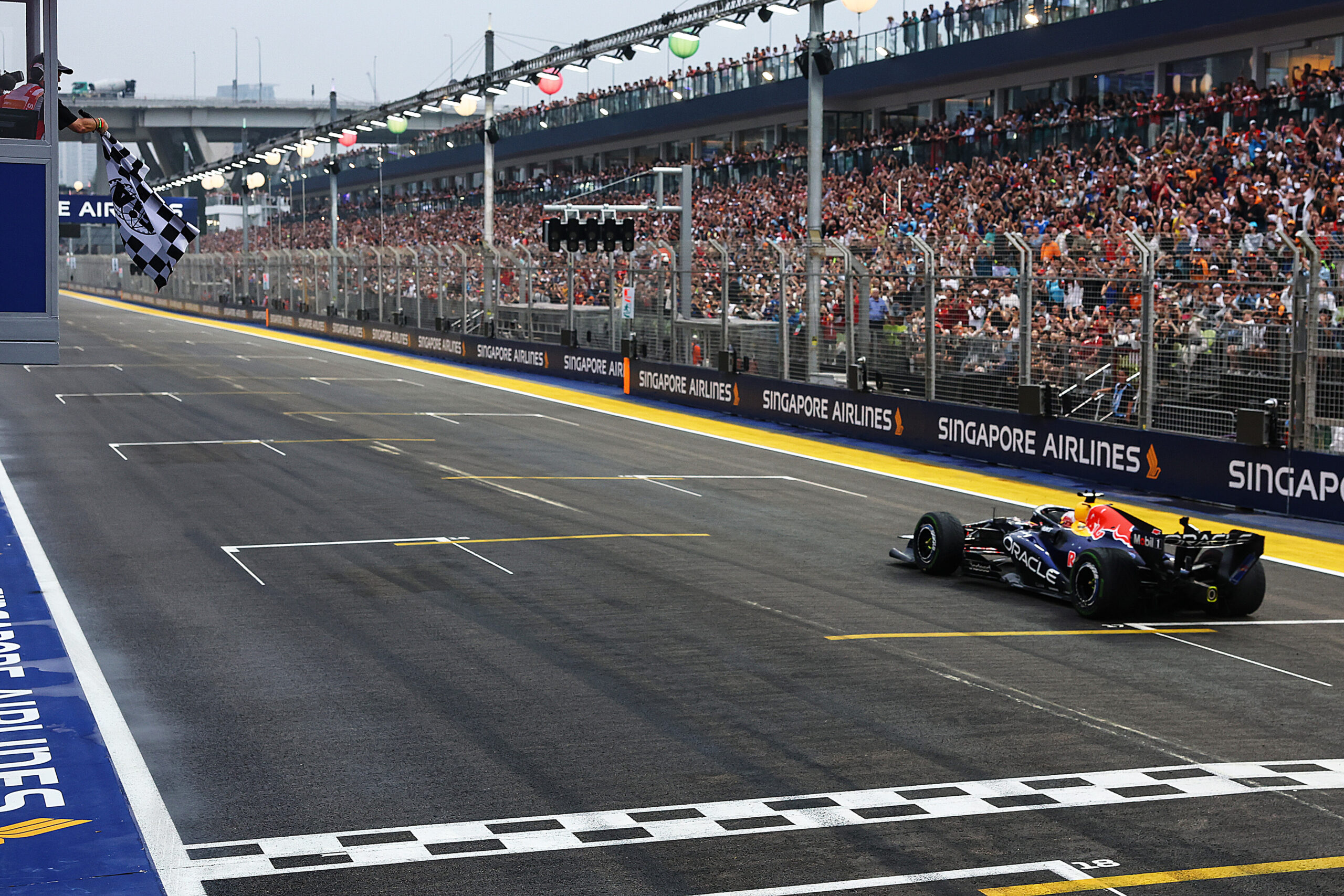Verstappen Wins Chaotic Singapore Sprint, Russell Crashes from the Lead