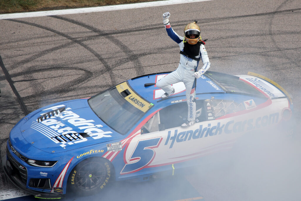Kyle Larson, driver of the #5 HendrickCars.com Chevrolet, celebrates after winning the NASCAR Cup Series Hollywood Casino 400 at Kansas Speedway on September 27, 2026 in Kansas City, Kansas. (Photo by Jonathan Bachman/Getty Images)